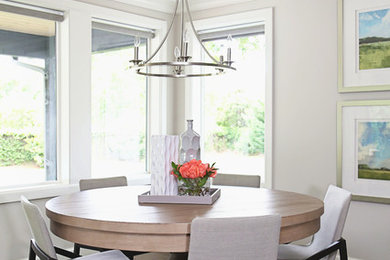 Enclosed dining room - mid-sized transitional medium tone wood floor and brown floor enclosed dining room idea in Other with gray walls and no fireplace