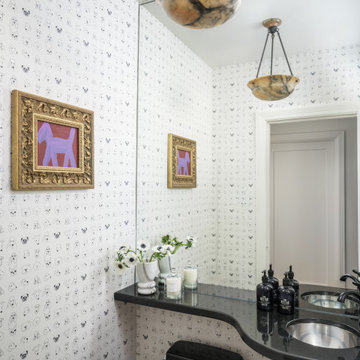 Playful Powder Room with Dog Wallpaper and Bold Black Fixtures