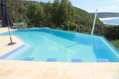 Fully Tiled Swimming Pool Using Waterline Glass Panel