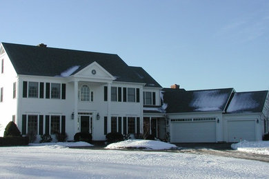 Inspiration for a timeless white two-story house exterior remodel in Bridgeport