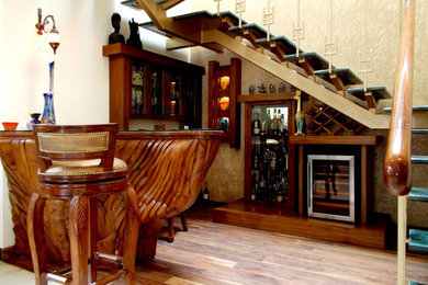 Example of a zen home bar design in Calgary
