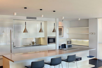 Example of a trendy kitchen design in San Francisco with an island