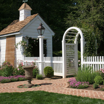 White Picket Fence with Rose Arbor