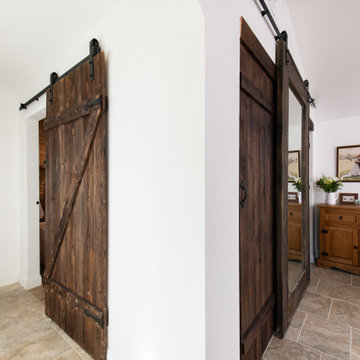 Room Addition with Barn Doors for Bathroom Entrance and Closet
