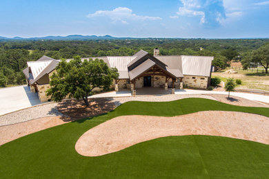 Example of an arts and crafts exterior home design in Austin