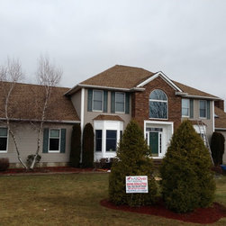 Roofing replacements - Roofing And Gutters
