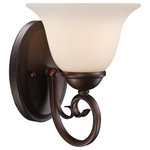 Trans Globe Lighting - Laredo II 7" Wall Sconce - The Laredo II Collection exhibits a unique wall sconce that is perfect for adding supplemental lighting to any interior wall space. The Spanish tone allows the wall sconce to stand out as both functional and decorative as it lights up any interior setting.  This single light fixture features an oval wall plate with matching hardware, scroll ironwork details, and a White Frost shade.