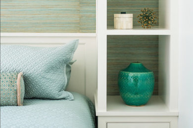 Bedroom - coastal master medium tone wood floor, brown floor and wallpaper bedroom idea in Providence with green walls