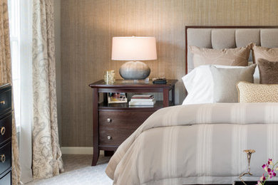 Example of a mid-sized transitional master carpeted bedroom design in New York with gray walls