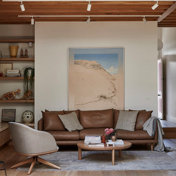 Little OG - view through courtyard to living room, with Kett Furniture  by Cosh 