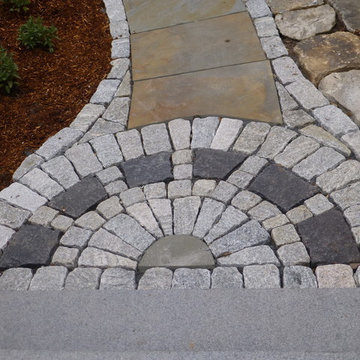 Bluestone Patio with Granite Cobblestone walls