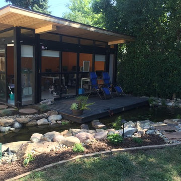 Modern office overlooking stream.