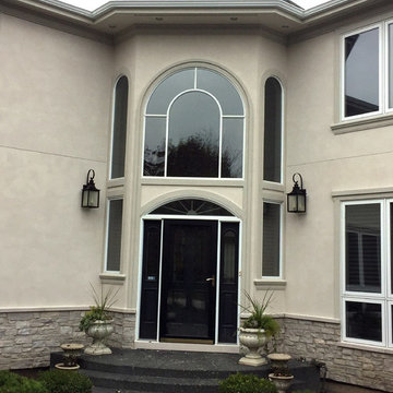 Dryvit into Stucco and Stone