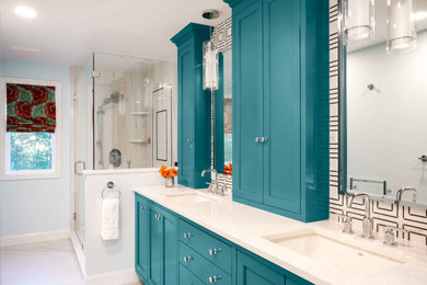 Mid-sized contemporary master bathroom in Boston with recessed-panel cabinets, turquoise cabinets, a corner shower, black and white tile, an undermount sink, white floor, a hinged shower door, a niche, a double vanity and white benchtops.