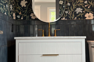 Example of a transitional powder room design in Philadelphia