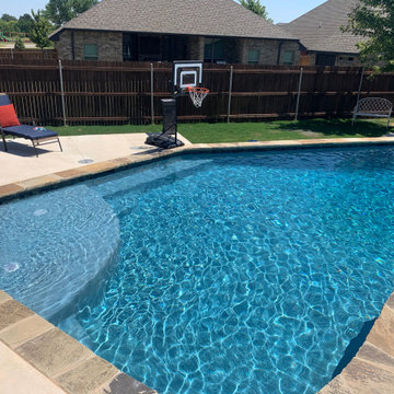 Custom Concrete Pool with Tanning Ledge, LED Lighting, Flagstone Coping