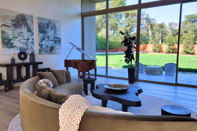 Large minimalist formal and open concept light wood floor and wood ceiling living room photo in San Francisco with white walls and no tv