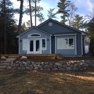Remodel After with Wood Deck and Stone Landscaping
