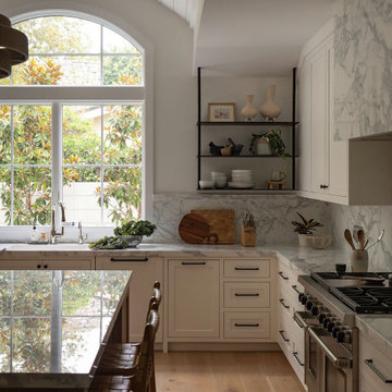 Marble Slab Range Backsplash with Plaster Hood Detail