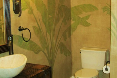 Example of an island style powder room design in Other