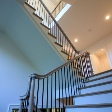 Project #93 | Captivating Staircase with Light Wood and Black Spindles