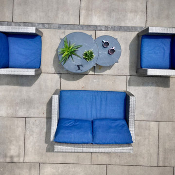Symmetrical Poolside Furniture Arrangement for Entertaining