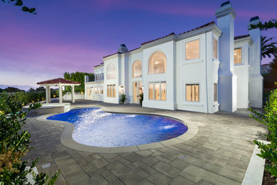 Example of a tuscan exterior home design in Orange County