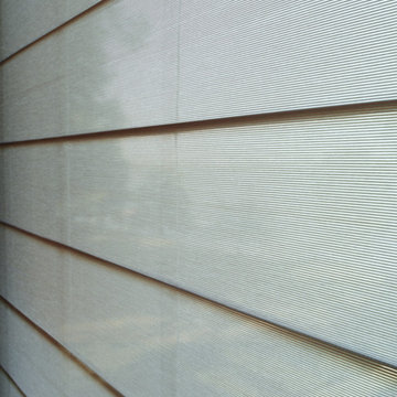 Hunter Douglas Alustra® Woven Textures® Roller Shades and Roman Shades