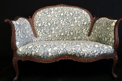 upholstered love seat with studding