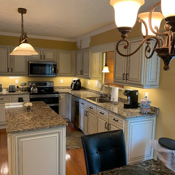 Cabinet reface with granite and new wall of cabinets