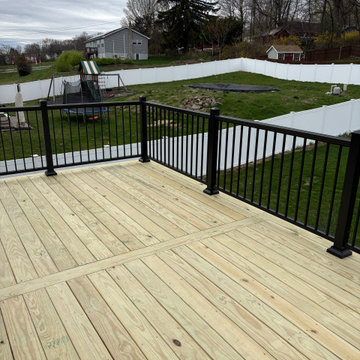 Pressure Treated Wood Deck with black powder coated rail