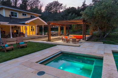 Patio - large craftsman backyard stone patio idea in San Francisco with a fire pit and a pergola