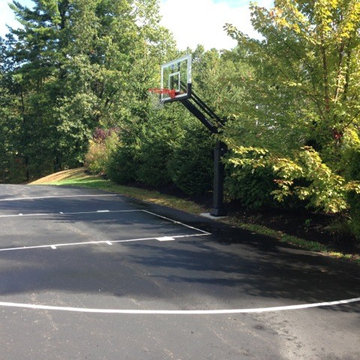Daniel R's Pro Dunk Gold Basketball System on a 50x45 in Bedford, NH