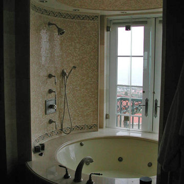 One of two large custom showers, this one over a large jetted tub