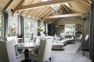 Large french country open concept family room photo in Vancouver