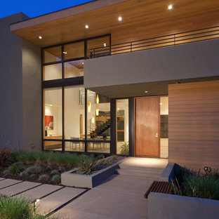 Inspiration for a mid-sized modern two-story mixed siding flat roof remodel in San Francisco