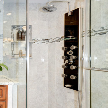 Elegant Master Bathroom Remodel with Quartz-Granite Hybrid Vanity and Spa Shower