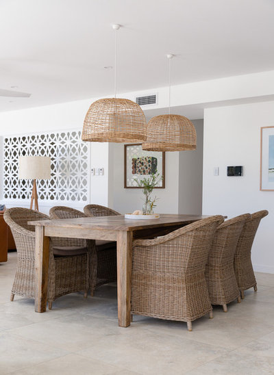Beach Style Dining Room by PRG Architects