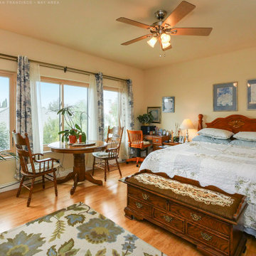 Wall of Wood Windows in Pretty Bedroom - Renewal by Andersen San Francisco Bay A