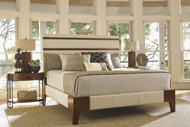 Inspiration for a large contemporary master bedroom in Orange County with beige walls, light hardwood floors and no fireplace.
