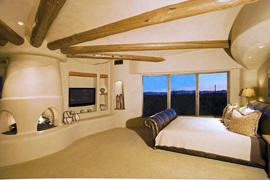 Inspiration for a mediterranean bedroom in Phoenix.