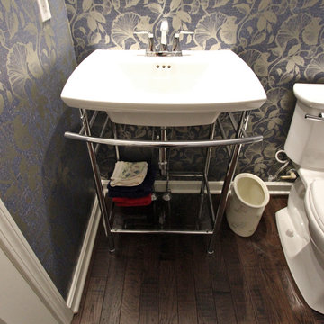 Transitional Powder Room with Metal Console Table Pedestal Sink