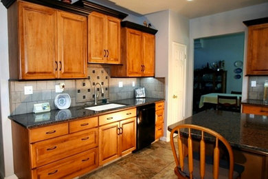 Kitchen - traditional kitchen idea in Other