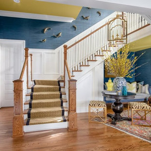 Inspiration for a large eclectic foyer in Nashville with blue walls and medium hardwood floors.