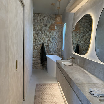 Custom Floating Vanity with Backlit Organic Mirrors