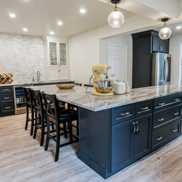 Farmhouse Kitchen With Large L-Shaped Charcoal Island