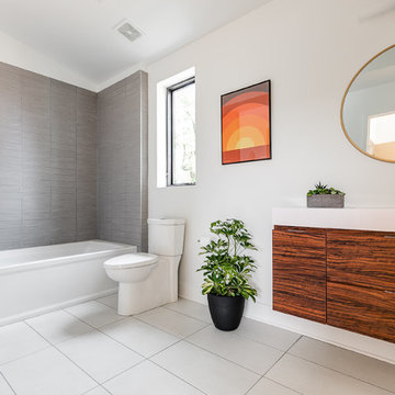Modern White Bathrooms with Dark Accents