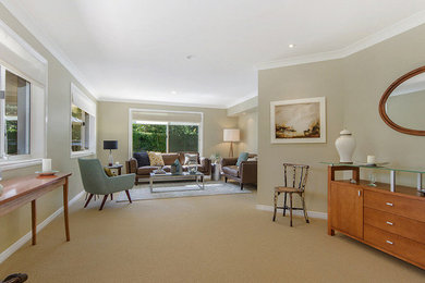 Design ideas for a large traditional enclosed family room in Gold Coast - Tweed with carpet.