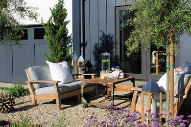 Beach style gravel patio photo in Orange County with no cover
