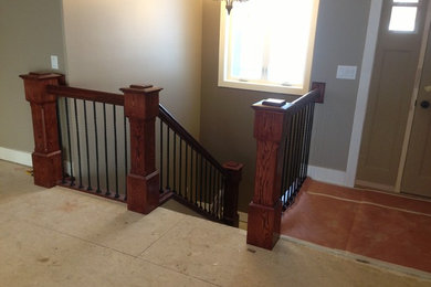 Example of a large classic carpeted u-shaped staircase design in Cedar Rapids with carpeted risers